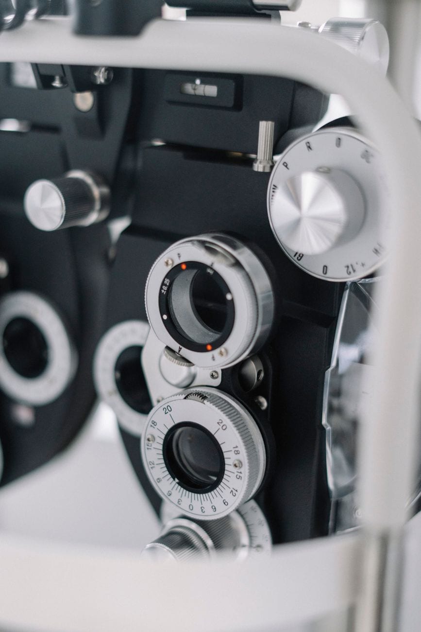 The dials of a phoropter in an eye exam room
